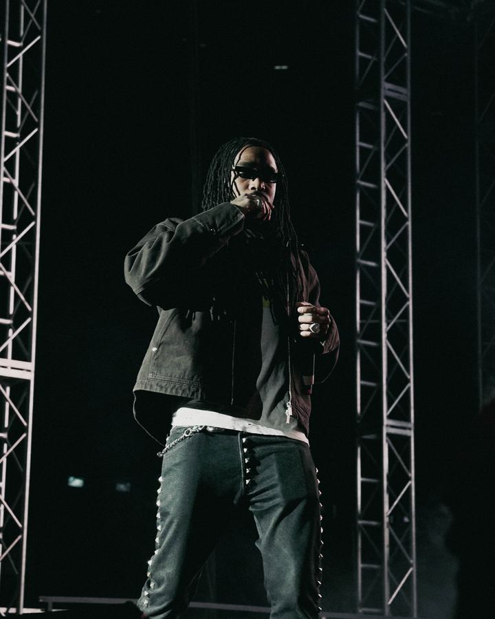 Concert photography - artist performing between stage trusses