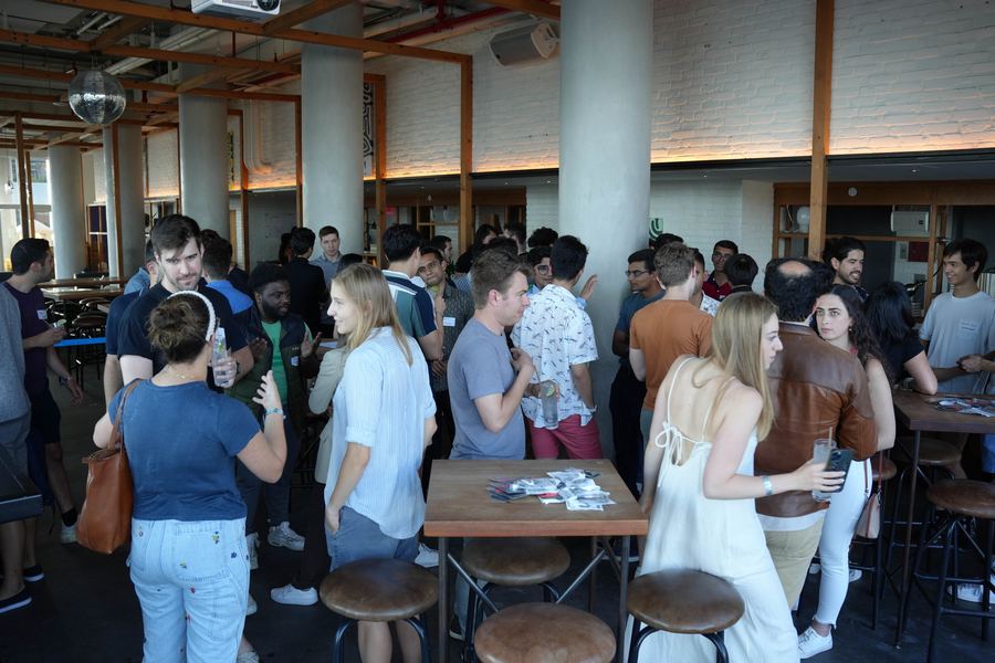 Event photography - wide establishing shot of packed networking venue